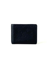 Louis Vuitton Monogram Taurillon Multiple Wallet 1